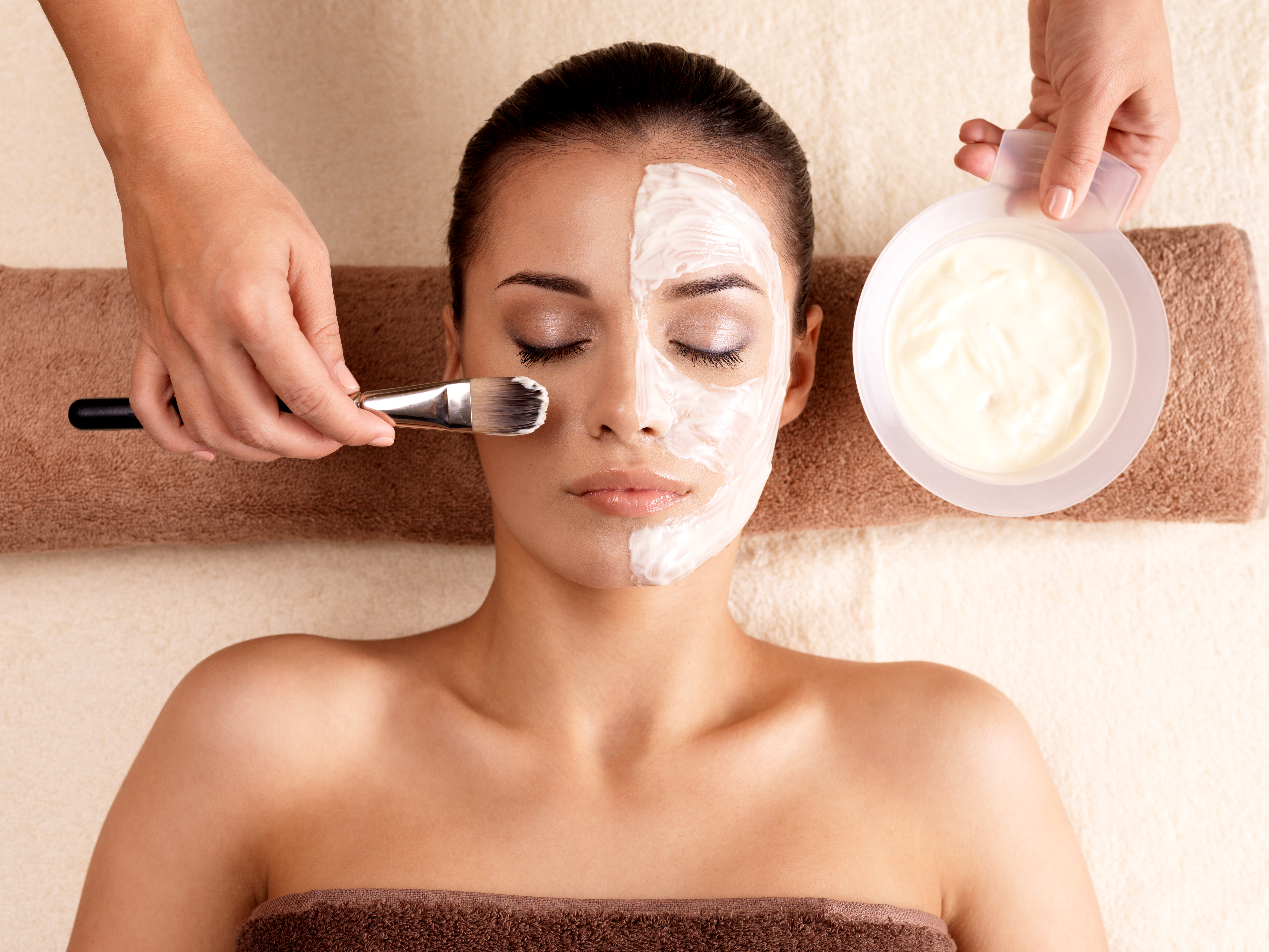 A girl having a facial treatment